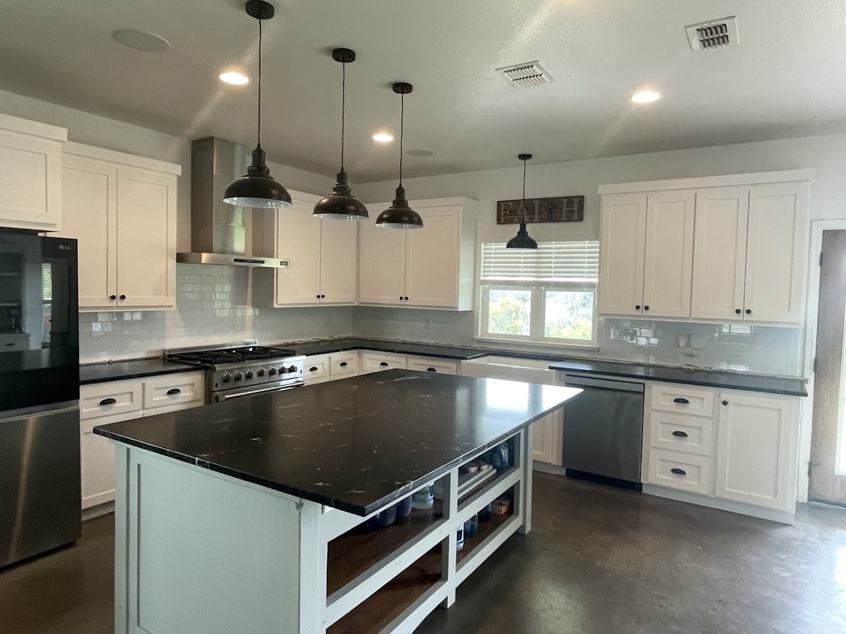Via Lactea granite kitchen countertops around electric range — Brownwood TX